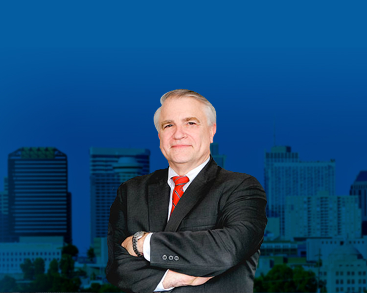 Attorney David Owen Day with a city at the background
